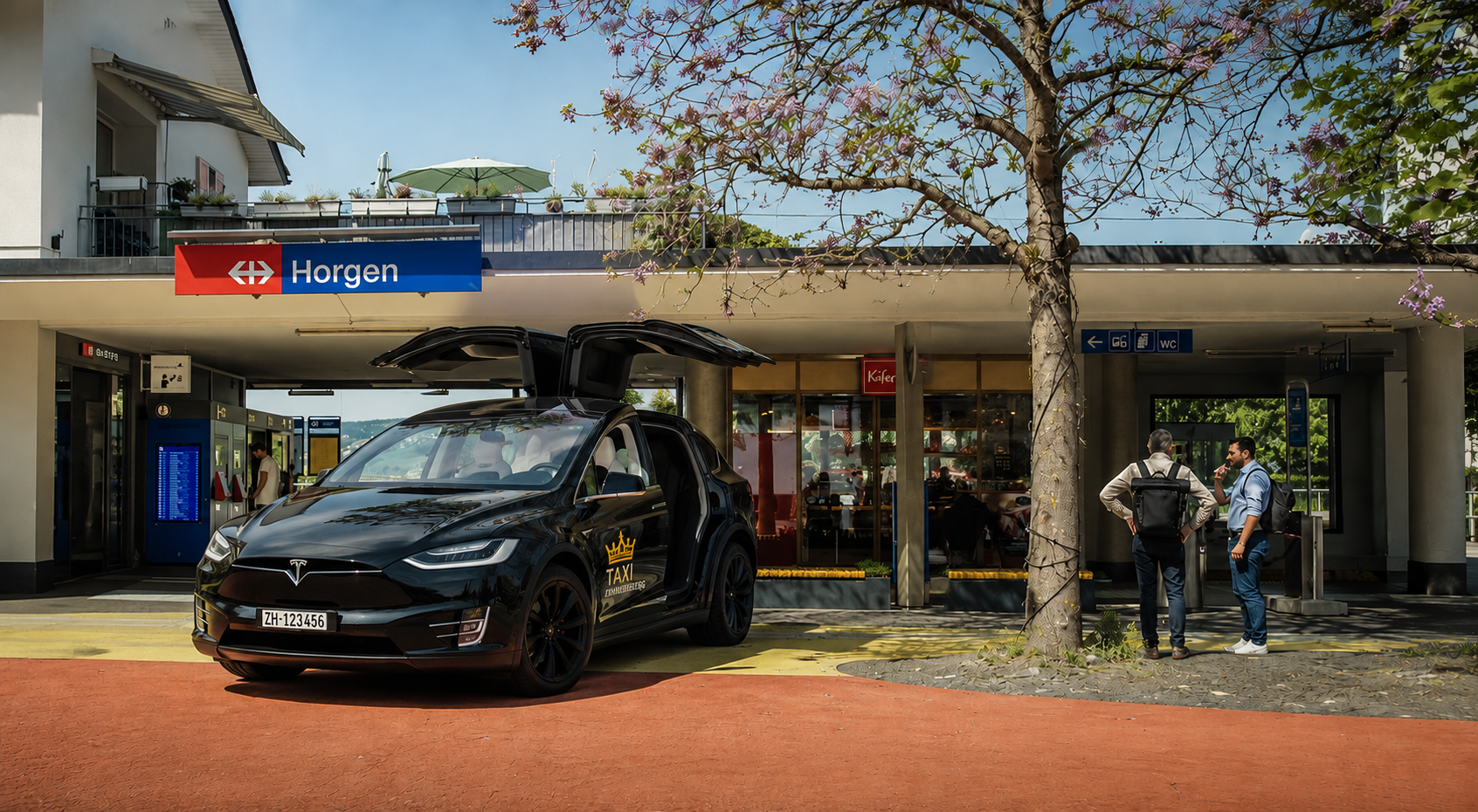 Taxi Zimmerberg Tesla Model X am Bahnhof Horgen